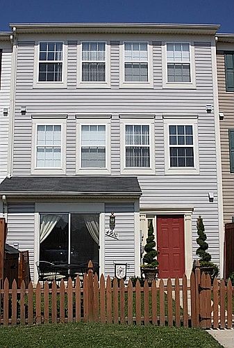 House front, except door is dark gray now