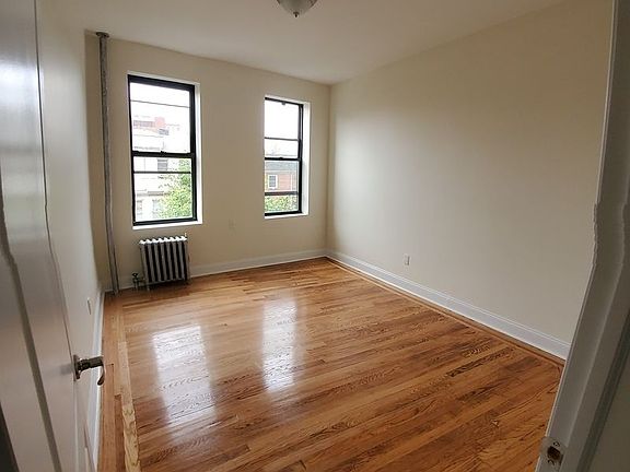 2nd image of 8742 Elmhurst Ave APT 3G