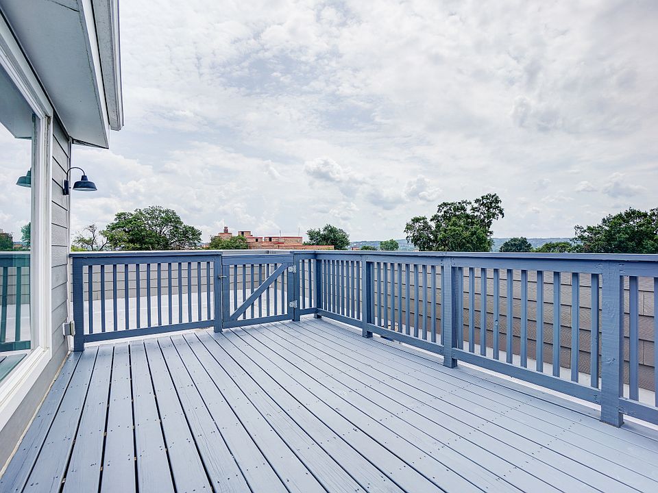 Private Roof Deck with Tree Top Views to the Washington Capitol and Beyond