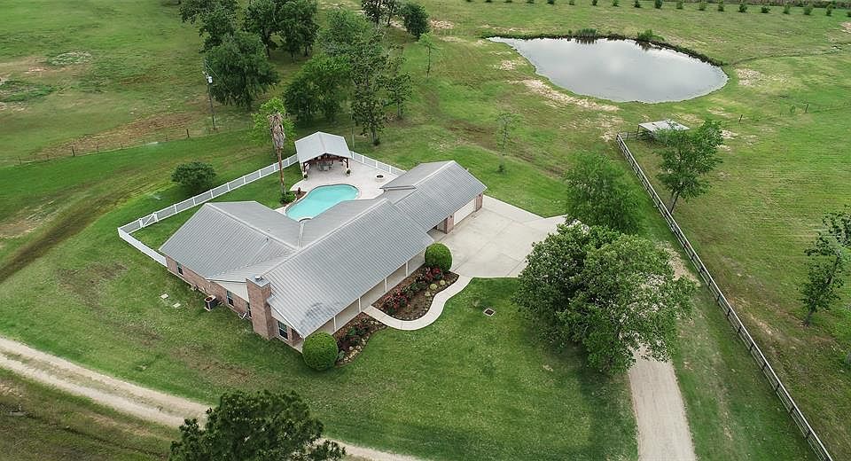Aerial View of home and Stocked Fishing Pond