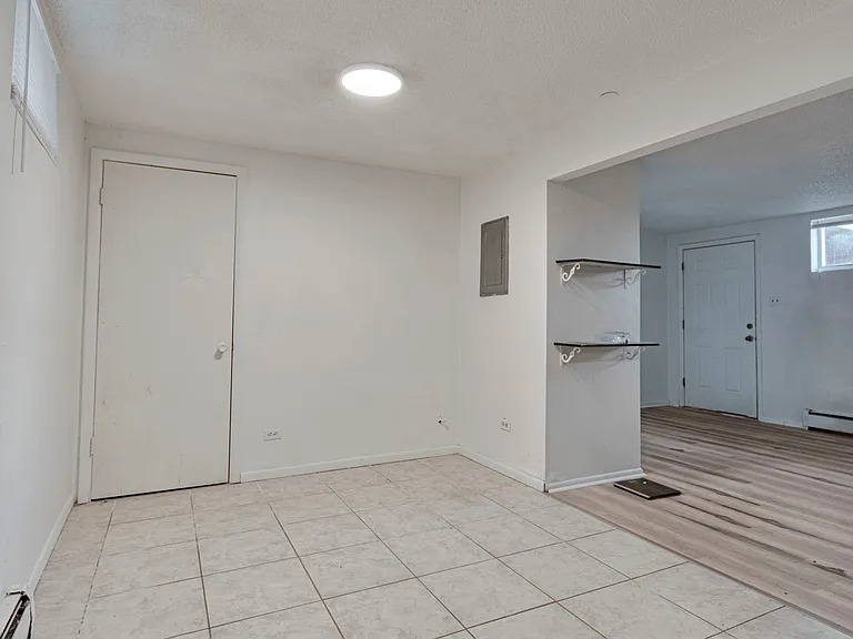 11521 W 61st Pl — Photo 7