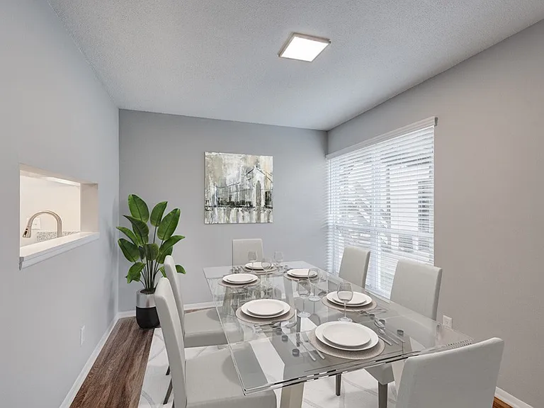 Explore the elegant dining space at Crossings @ 501 Apartments, designed for both style and comfort. Its modern aesthetic pairs perfectly with ample natural light, making every meal feel special. Schedule your visit today!