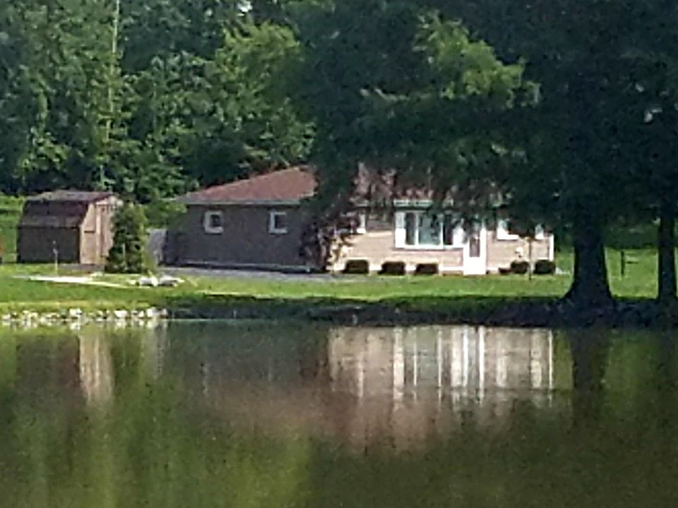 12213 Parrish Ave. north side from across the pond.