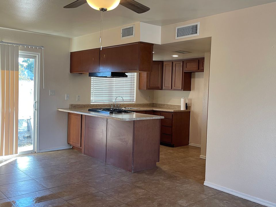 Kitchen, family room. New ceiling fan