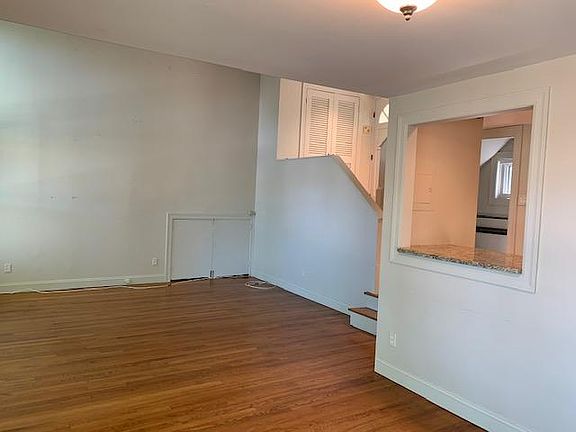 Step Down Living Room w/Hardwood Flooring