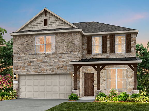 The Puma, a two-story home with 2-car garage, shown as Home Exterior C