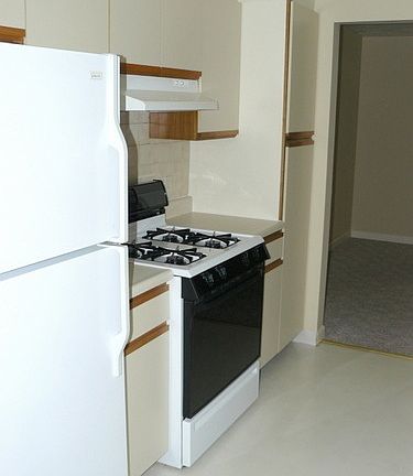 Gas stove in this galley kitchen