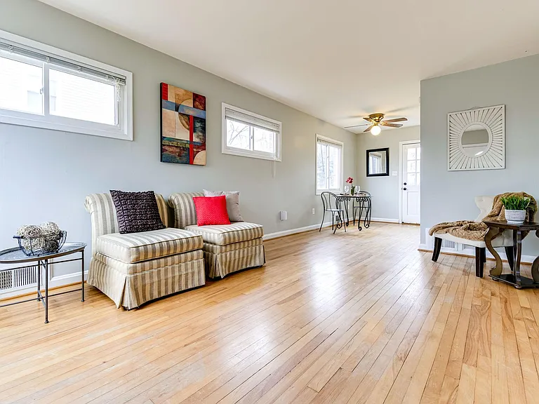 Hardwood floors now stained a darker color