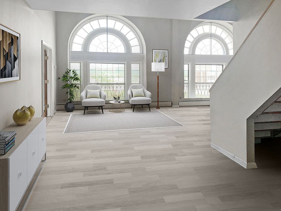Embrace the grandeur in this historic apartment building, where a spacious living room awaits