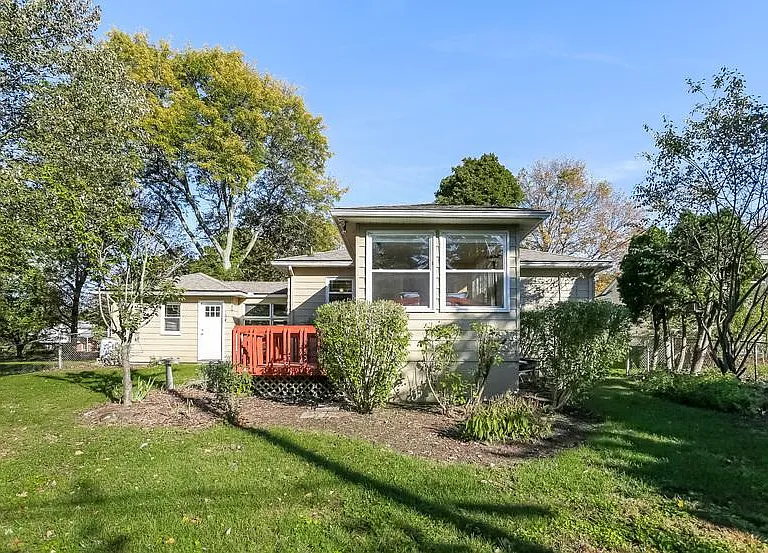 View of the sunroom from the backyard.