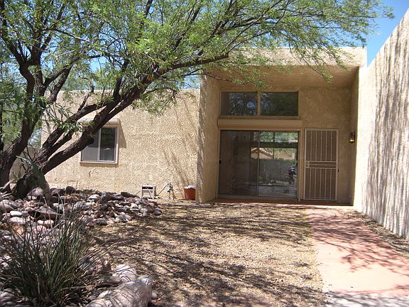 Front door w/open shutters 