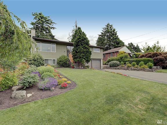 Welcome home! This lovely split-level sits on a large and gorgeous lot!