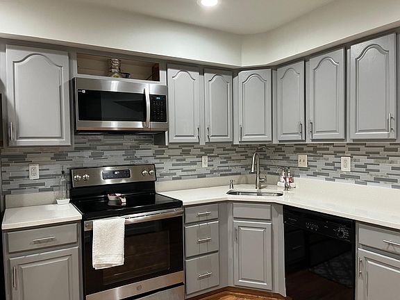 First Floor - Kitchen with brand new finished hardwood cabinets