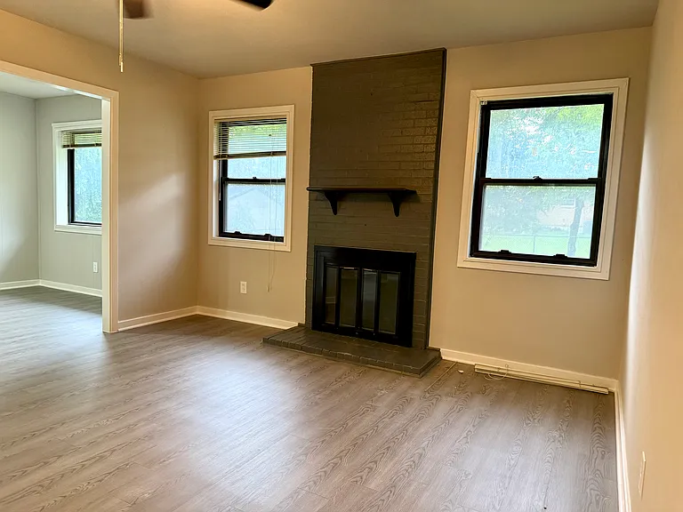 Living Room has fireplace. All floors are new.