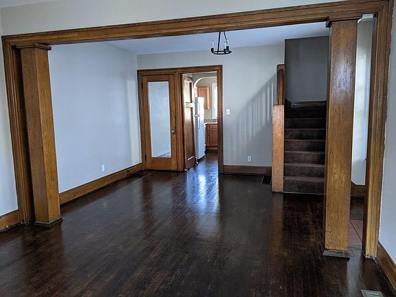 Dining room, Mirrored coat/storage closet and stairs up.