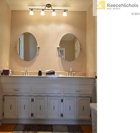 Double vanity, walk-in closet.