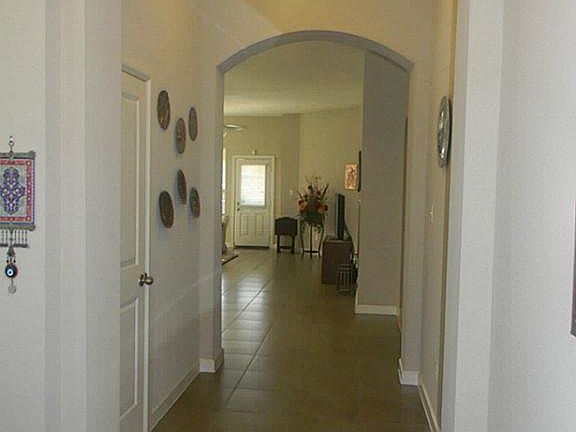 CERAMIC TILED ENTRY, KITCHEN AND WET AREAS.