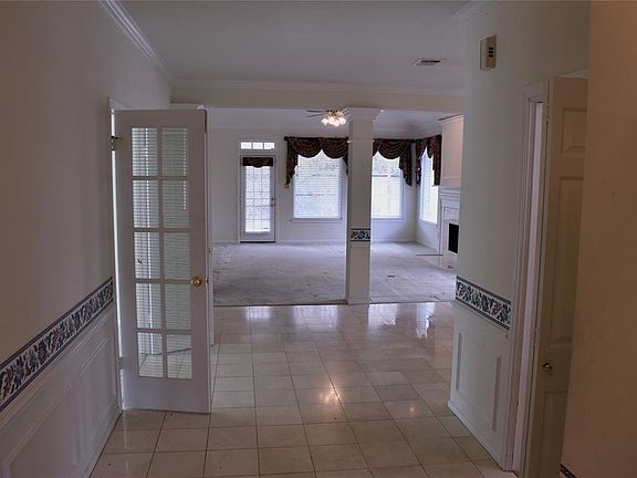 Entry view into Formal Dining into Living Room