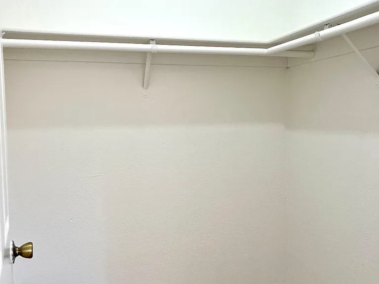 Walk-In closet for Upstairs second Bedroom.