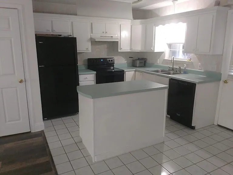 New Appliances! Flat glass top cook stove. Kitchen island. Plenty of storage! Bonus room off of kitchen!