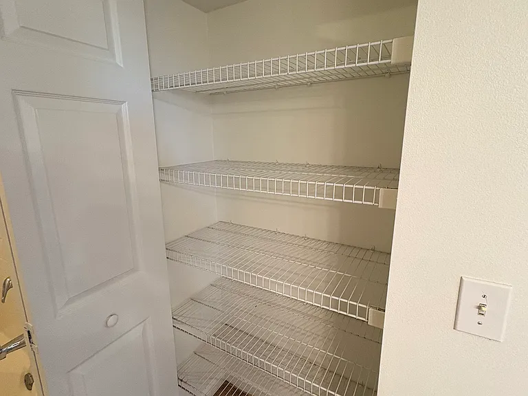 Master bathroom linen closet