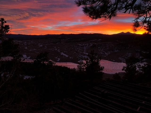 Longs Peak and Mt Meeker at sunset from the deck