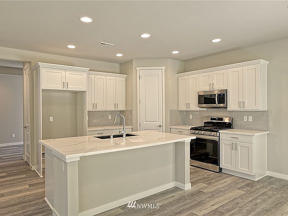 Photo is from another Huseby Homes community and may depict enhancements and features that are not available on all floor plans.