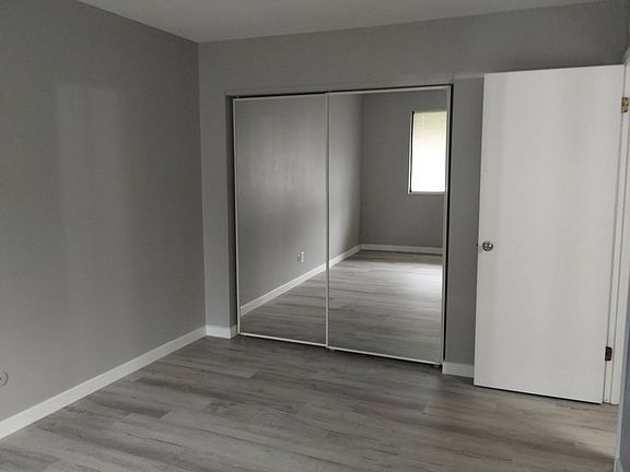 Bedroom was newly painted & new flooring.