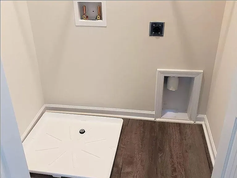 Laundry room conveniently located upstairs along with three bedrooms