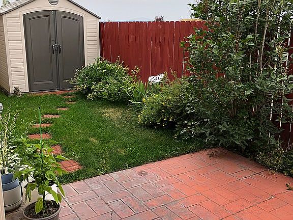 Landscaped and shed in back!