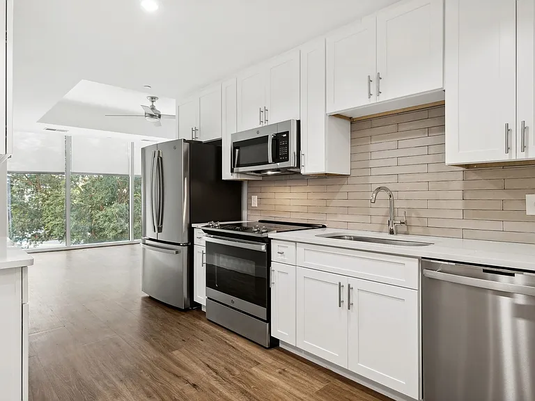 Modern kitchen with stainless steel appliances