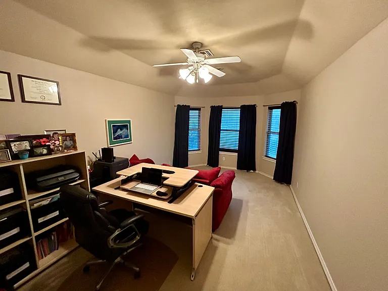 Home Office or however you want to use this space overlooking backyard