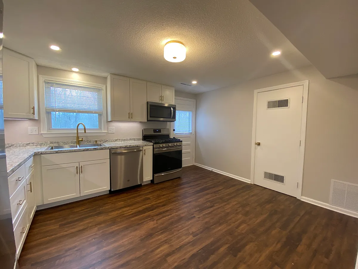 The door beside the range leads to the rear deck. - 128 Cheryl Ln #2LEFT