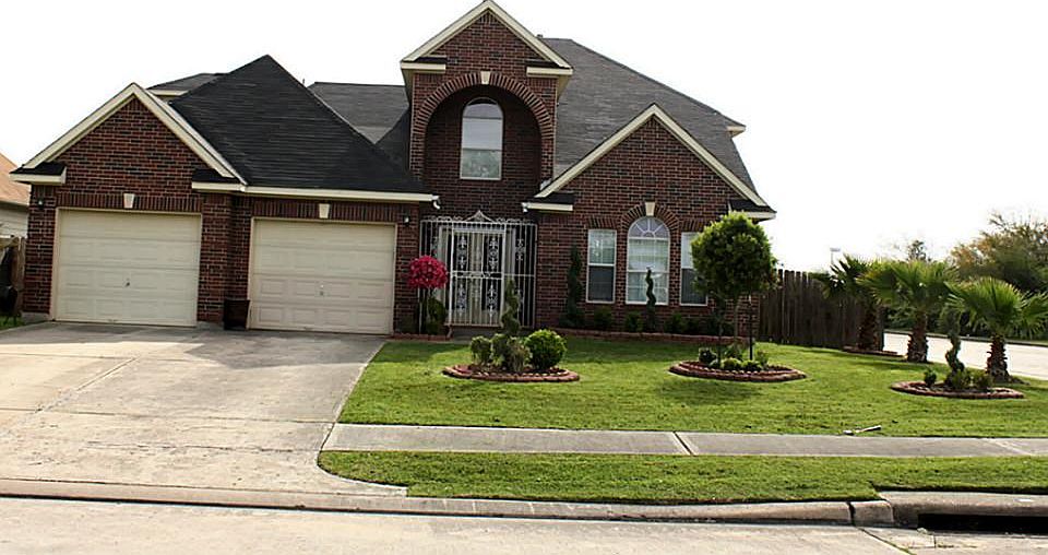 Front View with beautiful landscaping