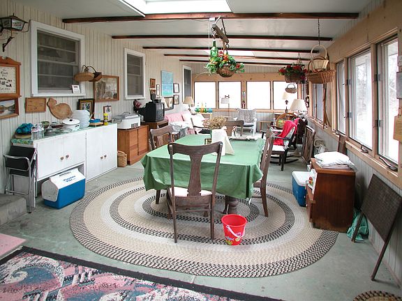Gigantic full-length enclosed porch