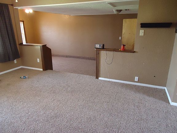 Living room looking into den