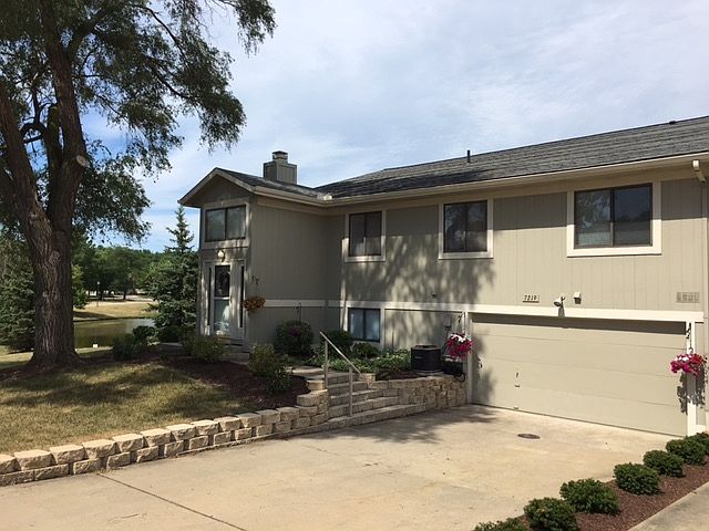large driveway with 2 car garage
