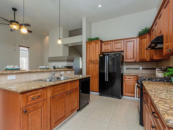 4th image of 6039 W Chennault Ave