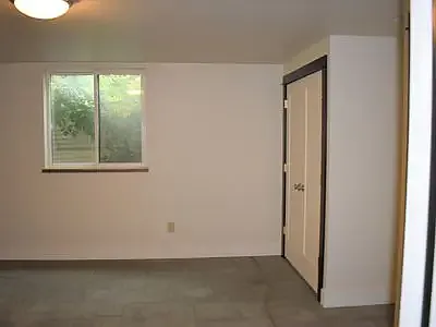 Basement bedroom (is fully furnished now) with two large closets.