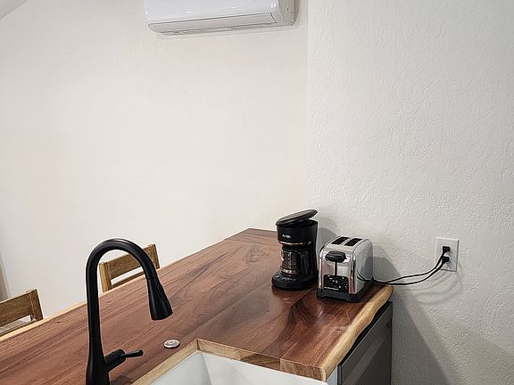 Dishwasher and wall heater/AC unit