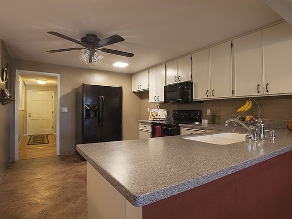 Kitchen w/ lots of room for entertaining
						:
						Enjoy time with family and friends in this open spacious kitchen