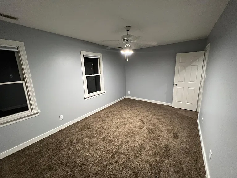 Bedroom 2, door to hallway on the right