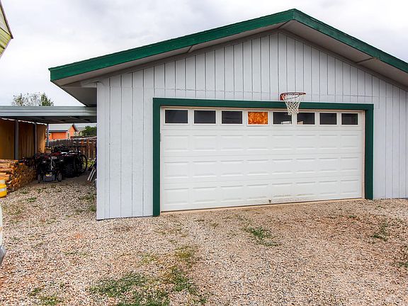Oversized 2 car with carport