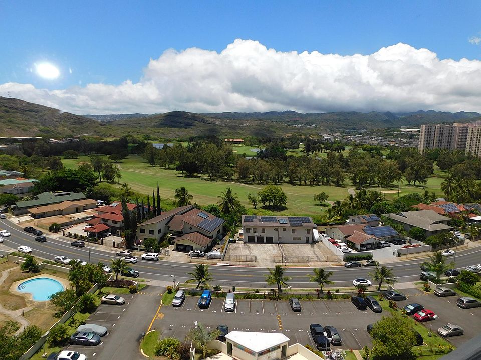 View of golf course and mountains - catch the tradewinds
