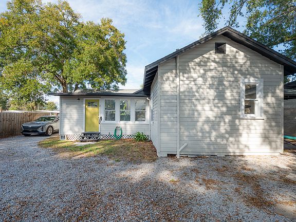 Front exterior of the unit with private covered patio and separate entry