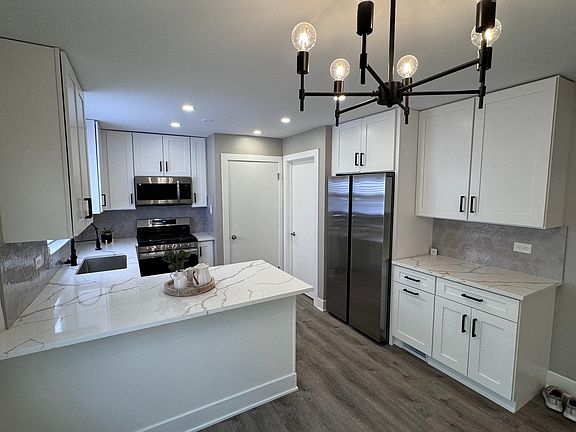5th image of 11132 S Avenue O