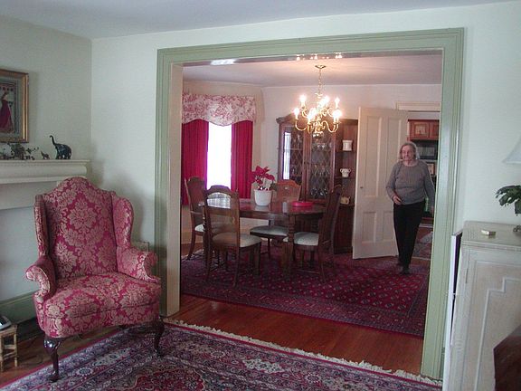 Dining room with full bay window and built-in china cabinet