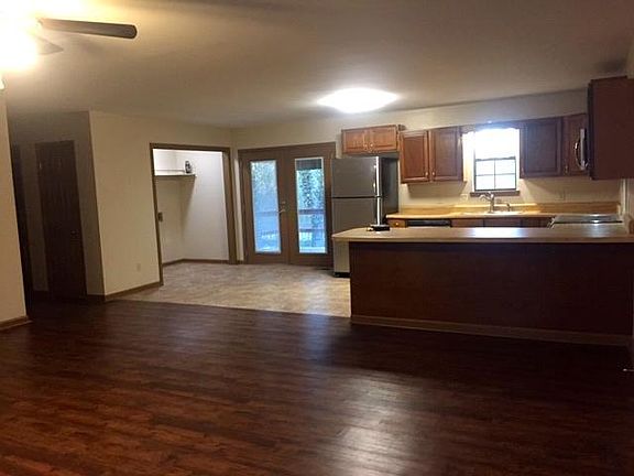 Open floor plan with sit at bar