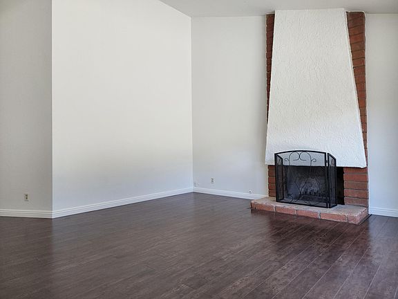 Large Living Room with Vaulted Ceiling and Fireplace