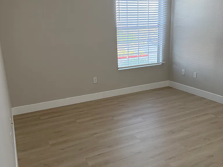 Master bedroom. New flooring, new ceiling fan, new blinds, freshly painted